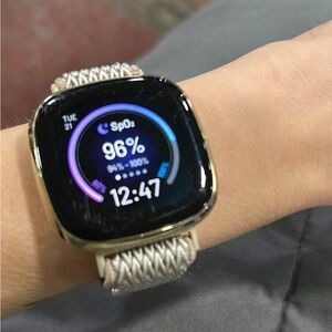 Fitbit Gold Smartwatch with Cream Band and Digital Display